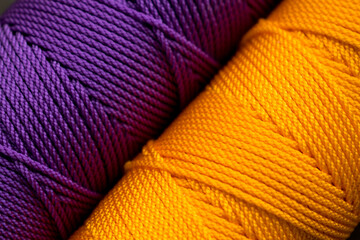 Close up of textured colorful rolls of thread for tailor work