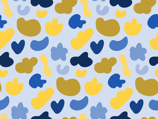 Seamless pattern vector background with yellow and blue colored random organic shape blobs on light blue backdrop. Simple texture for textile, fabric, wrapping paper