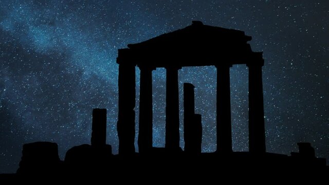 Athens, Greece: Gate of Athena Archegetis at Roman Agora with Stars and Milky Way in Background.