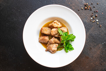 stewed meat ragout roast pork, lamb or turkey nutritious food organic products meal snack copy space food background rustic. top view keto or paleo diet