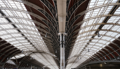 Perspective view of arched structural steel roof of a railway station.