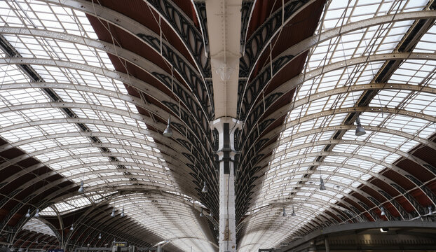 Perspective view of arched structural steel roof of a railway station.
