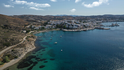 Fototapeta na wymiar Aerial drone photo of picturesque village of Adamantas main port a natural calm sea bay and safe anchorage of yachts and sail boats in volcanic island of Milos, Cyclades, Greece