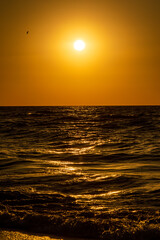 Gold sunrise on the beach
