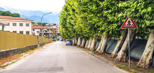 viale Della Cartiera avenue with secondary school building on the left in Atina town in the Italian...