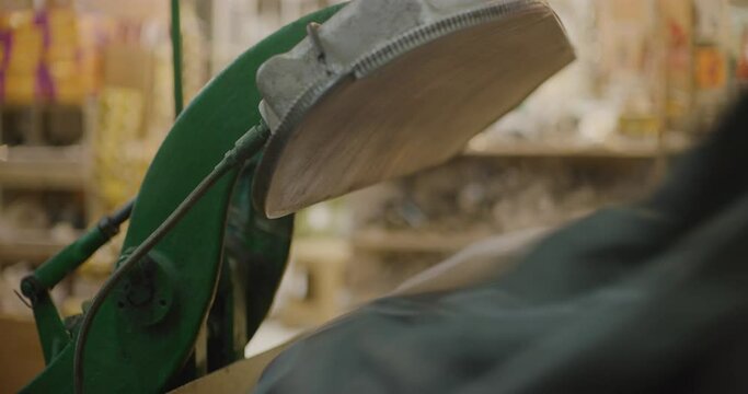 Traditional Steam Press Iron On Suit Jackets At The Grand Bazaar in Erbil, Iraq