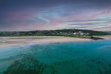 Aerial view of Inchydoney beach near Clonakilty in Ireland with people in the turquoise water on a...