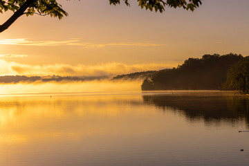 Fototapeta na wymiar Fog on Summersville Lake, WV, Near Sunset