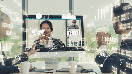 Creative visual of business people in a corporate staff meeting on video call . Concept of digital...