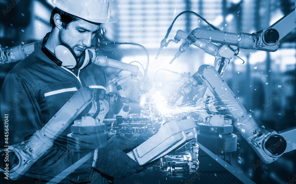 Poster mechanized industry robot arm and factory worker double exposure . concept of robotics technology fo