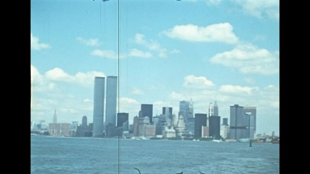 Old Twin Towers skyscrapers of New York city. Panorama from a boat tour on Hudson river of Manhattan Upper Bay of New York City in 1976. Archival of Manhattan skyline.