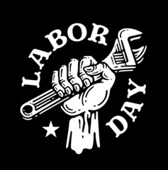 Hand grabbing a wrench for symbol labor day