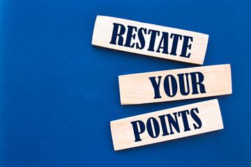 Text sign showing RESTATE YOUR POINTS