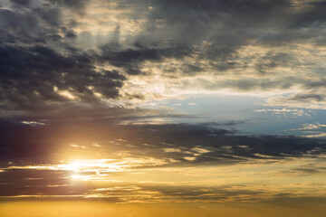 Fototapeta na wymiar Beautiful colorful sunset sky with few clouds