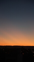 yellow and orange sunset over the city