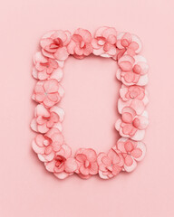 Obraz premium Floral frame with small pink Hydrangea flowers, natural floral flat lay in summer seasonal style. Minimal monochrome top view