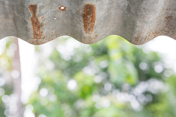 Rusted zinc roof on natural bokeh  background