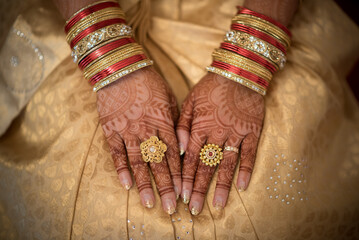 Indian bride's hands and feet adorned with henna