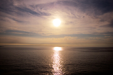 The sunset surrounded by clouds with a dreamy atmosphere and reflected in the sea in the Gogunsan Islands of Korea