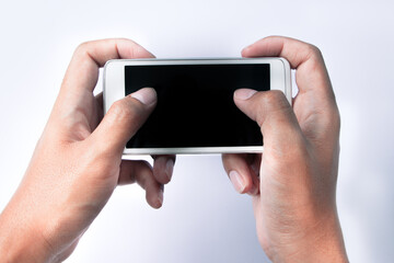 Close up blank screen mobile phone in male hand