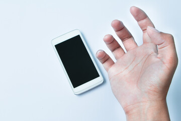 Close up blank screen mobile phone in male hand