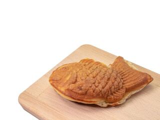 Japan Azuki Taiyaki, a close up of Japanese traditional fish shape red bean paste cake dessert isolated on white background.