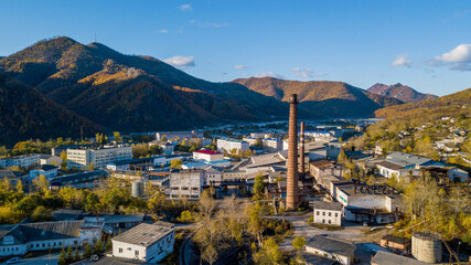 Fototapeta na wymiar A small town in the Primorsk Territory Dalnegorsk. View from above. An industrial city that mines ore.