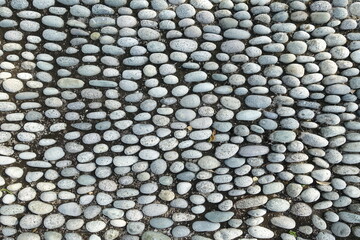 Top view pebble stone, foot reflexology.