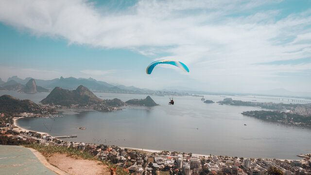 Paraglider jumps off from the Niteroi City Park in Charitas, Brazil