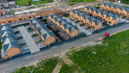 Brand new row of three story single family houses suburban location. Modern design of urban living...