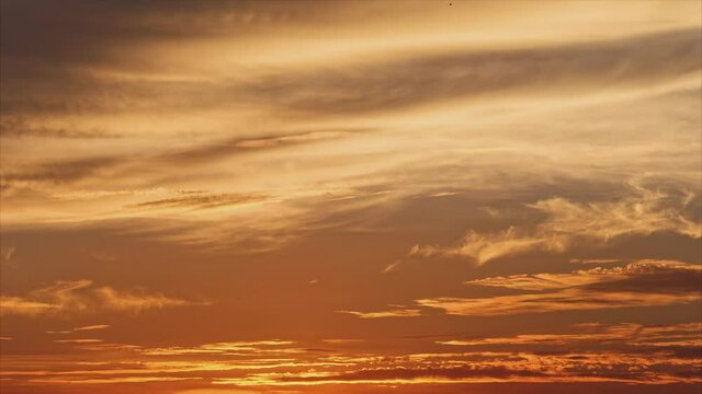 Close up clouds with light during sunset time nature background Time Lapse footage, red orange blue sunset sky cloud 4k footage.
