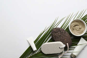 Flat lay composition with pumice stones on light background. Space for text