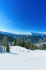 Switzerland, Alps, spring is here, there are some tourists.