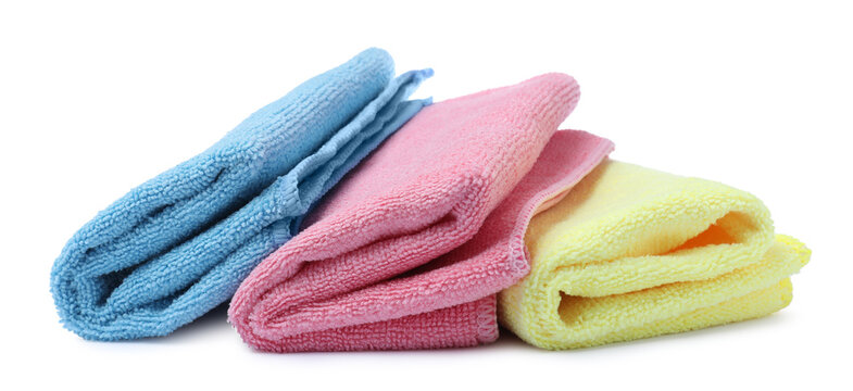 Many colorful microfiber cloths on white background