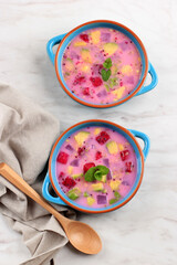 Top View Ready to Eat Sop Buah or Es Buah is Mixed Fruit with Coconut or Simple Syrup, Served with Shaved Ice and add Condensed Milk. Popular for Buka Puasa (Breakfasting)