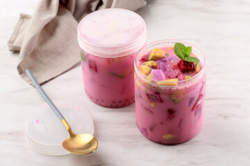 Ready to Eat Sop Buah or Es Buah is Mixed Fruit with Coconut or Simple Syrup, Served with Shaved Ice and add Condensed Milk. Popular for Buka Puasa (Breakfasting)