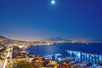 Naklejka premium View of the sea in the moonlight in the province of Naples, Italy