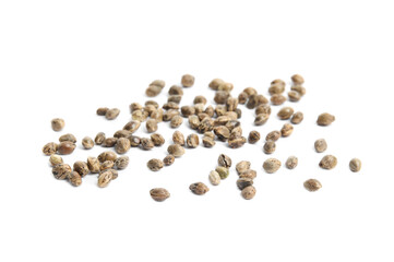 Raw organic hemp seeds on white background