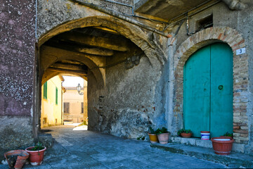 An alley between the houses of Torrecuso, an old town in the province of Benevento, Italy