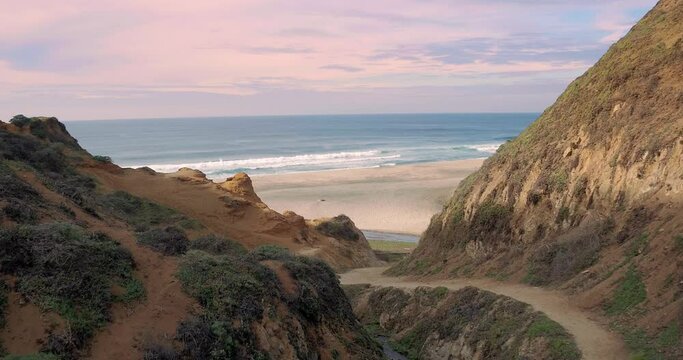 Aerial: flying over a seashore in point Reyes. San Francisco, California, USA