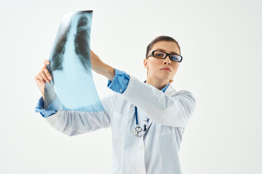 female doctor in white coat medicine health specialist professional x-ray