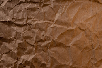 Fototapeta premium crumpled paper.sheet of brown cardboard paper. detailed high resolution texture. abstract background for wallpaper.
