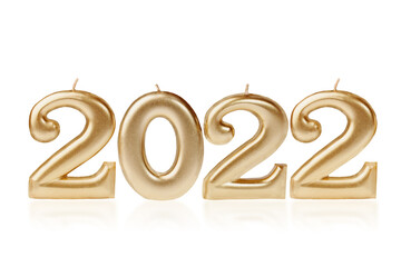 Holiday background Happy New Year 2022. Digits of year 2022 made by burning gold candles on red...