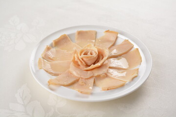 raw 10 head fresh abalone in slice and whole piece in white background asian seafood halal sashimi menu