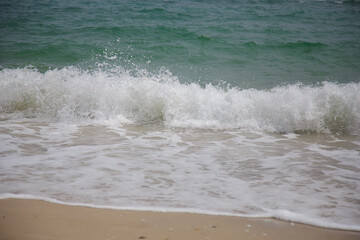 Fototapeta na wymiar Sea wave, spray