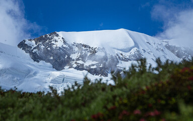 Glaciers and snow between the alps near the matterhorn and Monte Rosa, near the town of Zermatt, Switzerland - June 2021