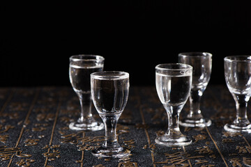 liquor or liquor is poured into a glass from a bottle background