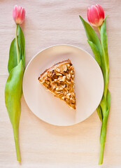 cheese cake decorated with carmel and peanuts
