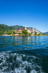 Lake maggiore during a sunny spring day near the Borromean islands and the town of Stresa, Italy - June 2021