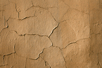 Brown wall with cracks and vignette